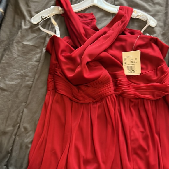 It’s the 2nd bridesmaid dress in candy apple red and it has a split on side - Picture 5 of 6